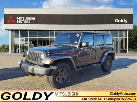 2016 Jeep Wrangler Unlimited for sale at Goldy Chrysler Dodge Jeep Ram Mitsubishi in Huntington WV