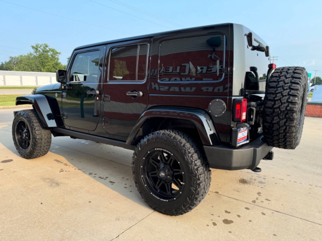 2015 Jeep Wrangler Unlimited for sale at Illinois Auto Wholesalers in Tolono, IL