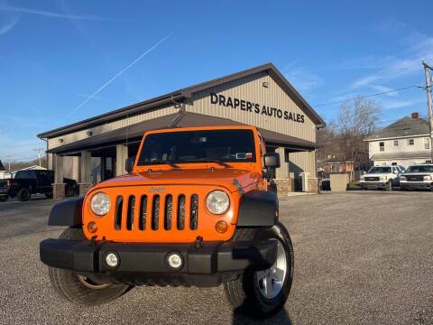 2013 Jeep Wrangler Unlimited for sale at Drapers Auto Sales in Peru IN