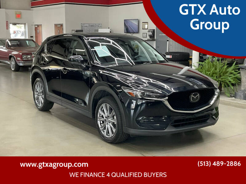 2021 Mazda CX-5 for sale at GTX Auto Group in West Chester OH