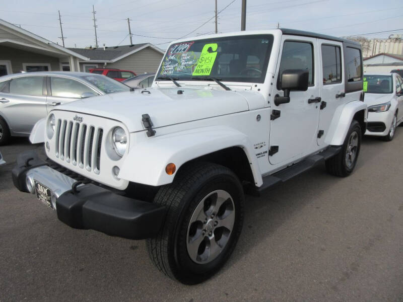 2016 Jeep Wrangler Unlimited for sale at Dam Auto Sales in Sioux City IA