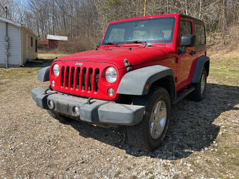 2014 Jeep Wrangler for sale at Riley Auto Sales LLC in Nelsonville OH