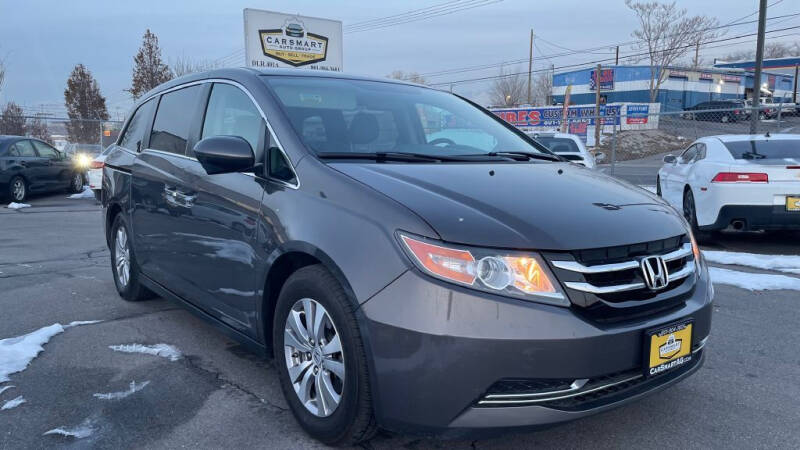 2016 Honda Odyssey for sale at CarSmart Auto Group in Murray UT
