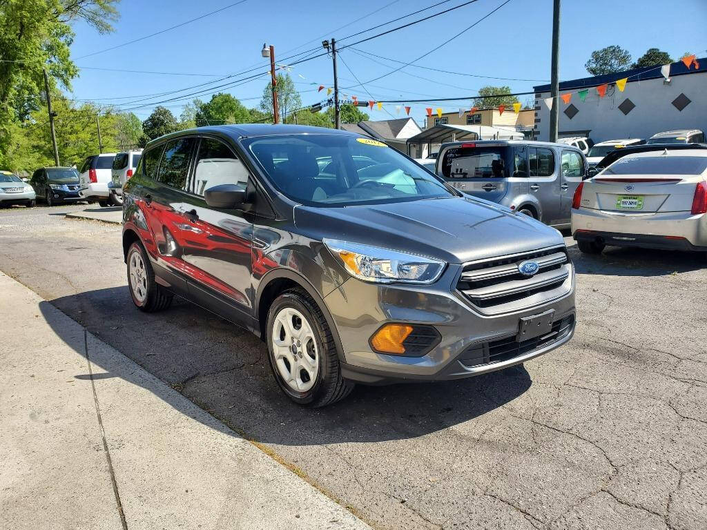 2017 Ford Escape for sale at DAGO'S AUTO SALES LLC in Dalton, GA