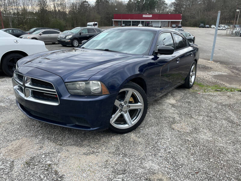 2013 Dodge Charger for sale at Certified Motors LLC in Mableton GA