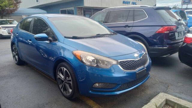 2014 Kia Forte for sale at Tri City Auto Mart in Lexington KY