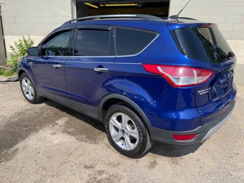 2014 Ford Escape for sale at TIM'S AUTO SOURCING LIMITED in Tallmadge OH