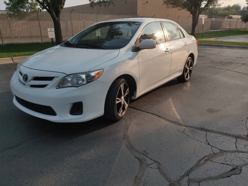2012 Toyota Corolla for sale at ACTION AUTO GROUP LLC in Roselle IL