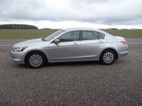 2009 Honda Accord for sale at Howe's Auto Sales in Grelton OH