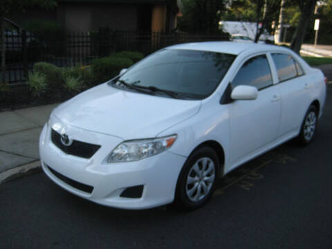 2010 Toyota Corolla for sale at Top Choice Auto Inc in Massapequa Park NY