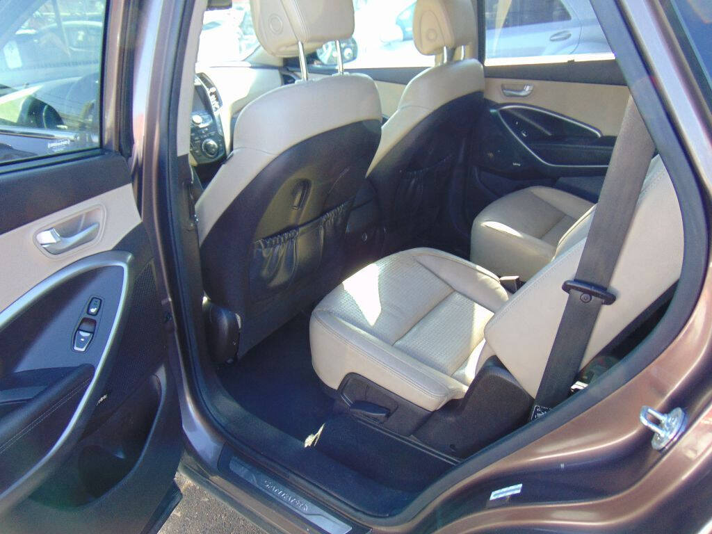 2014 Hyundai SANTA FE for sale at Avalanche Auto Sales in Denver, CO