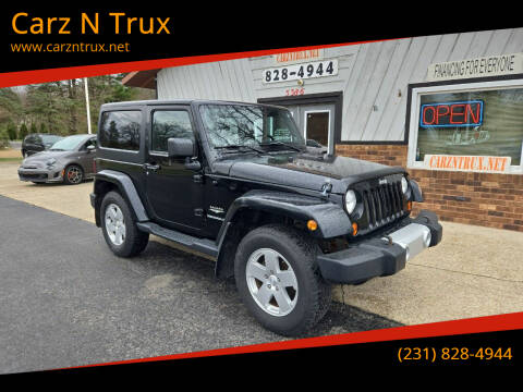 2011 Jeep Wrangler for sale at Carz N Trux in Twin Lake MI