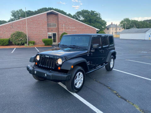 2010 Jeep Wrangler Unlimited for sale at New England Cars in Attleboro MA