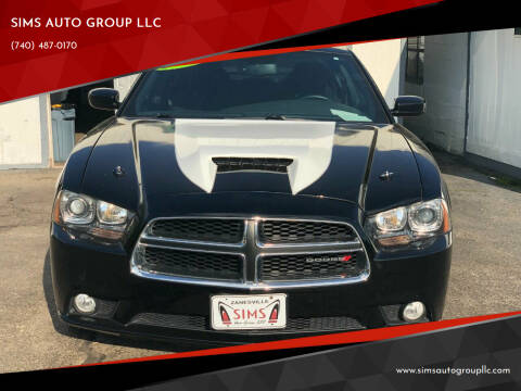 2013 Dodge Charger for sale at SIMS AUTO GROUP LLC in Zanesville OH
