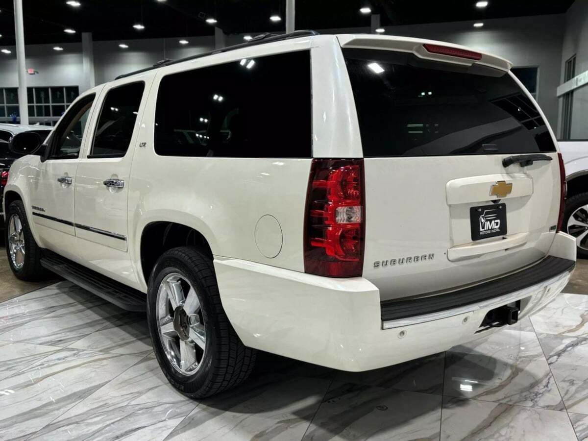 2012 Chevrolet Suburban for sale at IMD MOTORS, INC in Dallas, TX