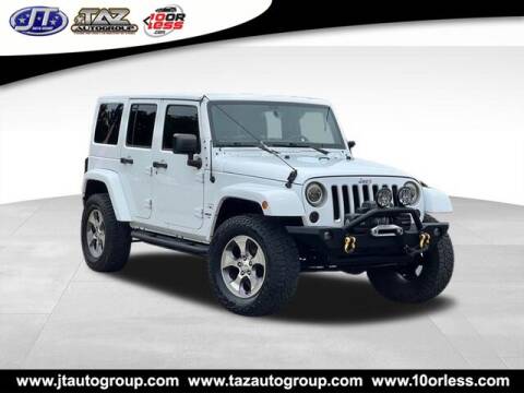 2016 Jeep Wrangler Unlimited for sale at J T Auto Group in Sanford NC