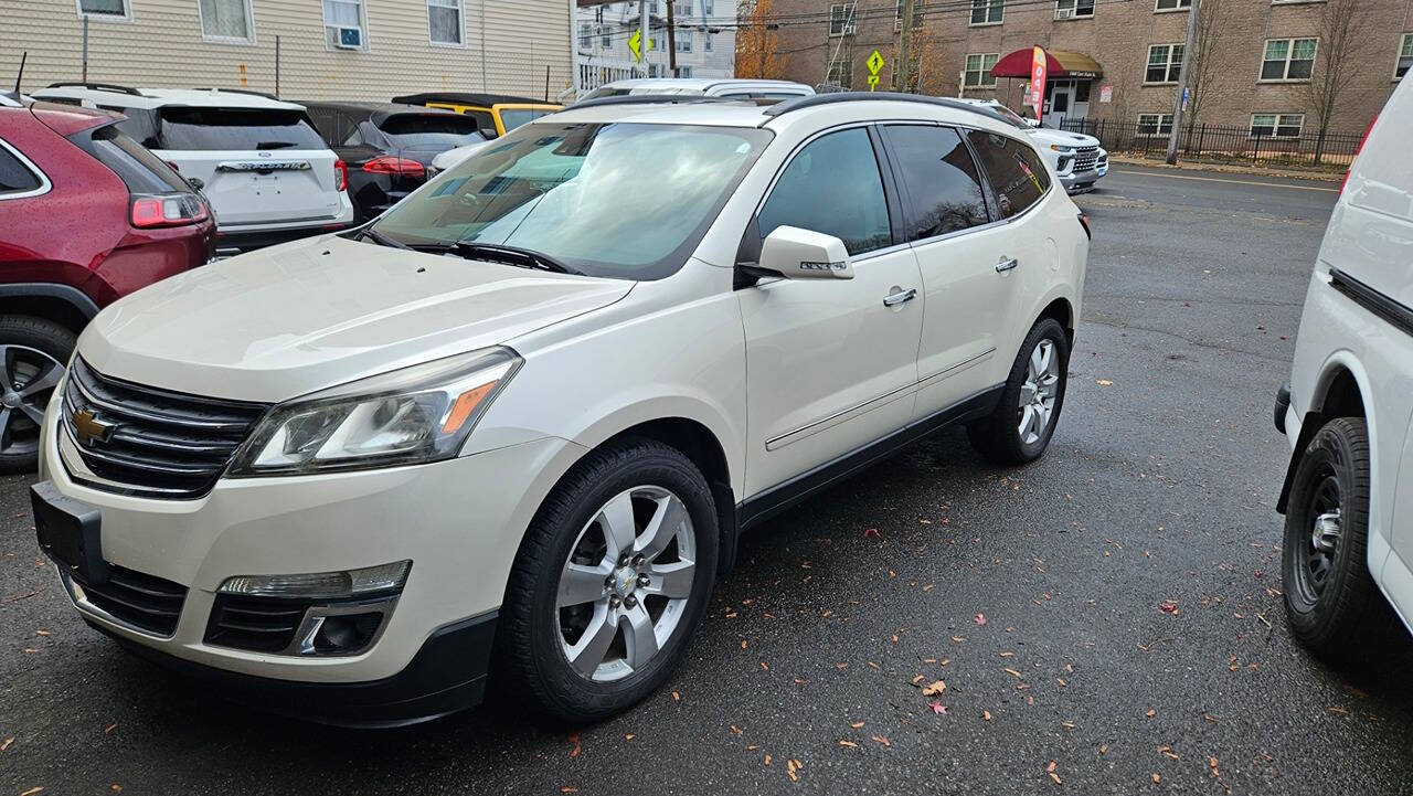 2014 Chevrolet Traverse for sale at RENOS AUTO SALES LLC in Waterbury, CT