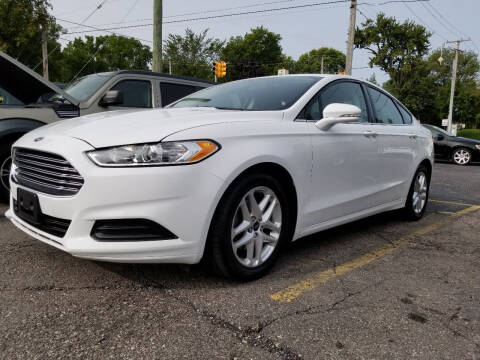 2016 Ford Fusion for sale at DALE'S AUTO INC in Mount Clemens MI