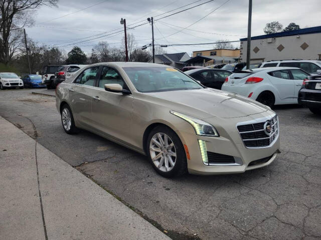 2014 Cadillac CTS for sale at DAGO'S AUTO SALES LLC in Dalton, GA