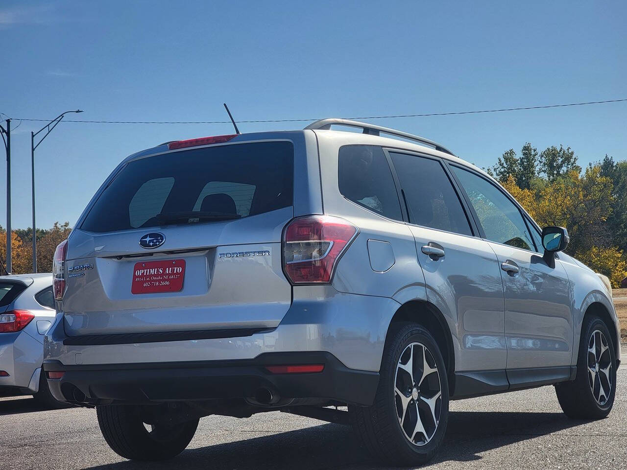 2014 Subaru Forester for sale at Optimus Auto in Omaha, NE