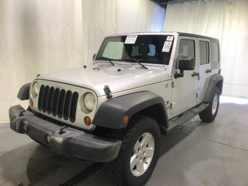 2009 Jeep Wrangler Unlimited for sale at The Car Store in Milford MA