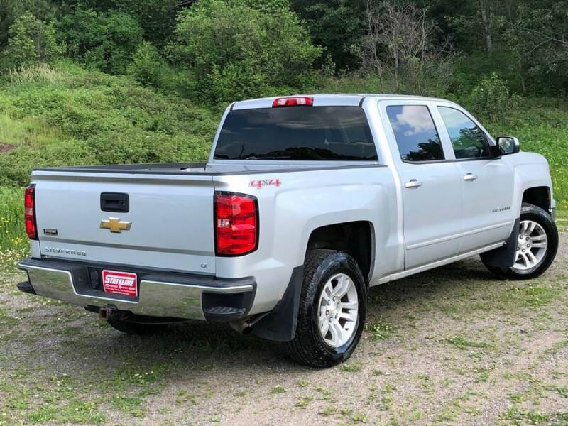 Used 2015 Chevrolet Silverado 1500 LT with VIN 3GCUKREC5FG237431 for sale in Iron River, MI