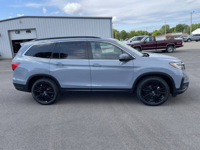 Used 2022 Honda Pilot SE with VIN 5FNYF6H25NB039587 for sale in Maquoketa, IA