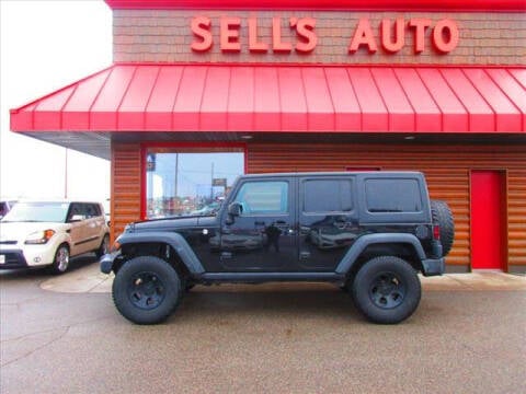 2016 Jeep Wrangler Unlimited for sale at Sells Auto INC in Saint Cloud MN