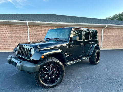 2014 Jeep Wrangler Unlimited for sale at Lux Motors Loganville in Loganville GA