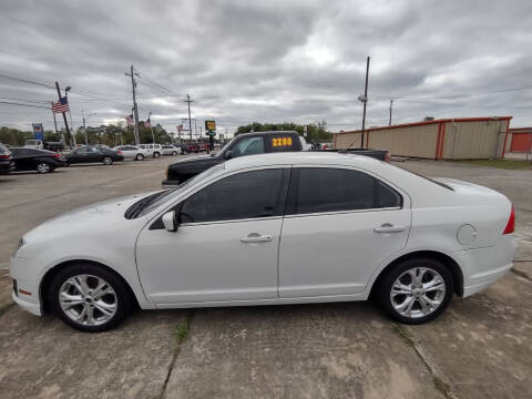 2012 Ford Fusion for sale at BIG 7 USED CARS INC in League City TX
