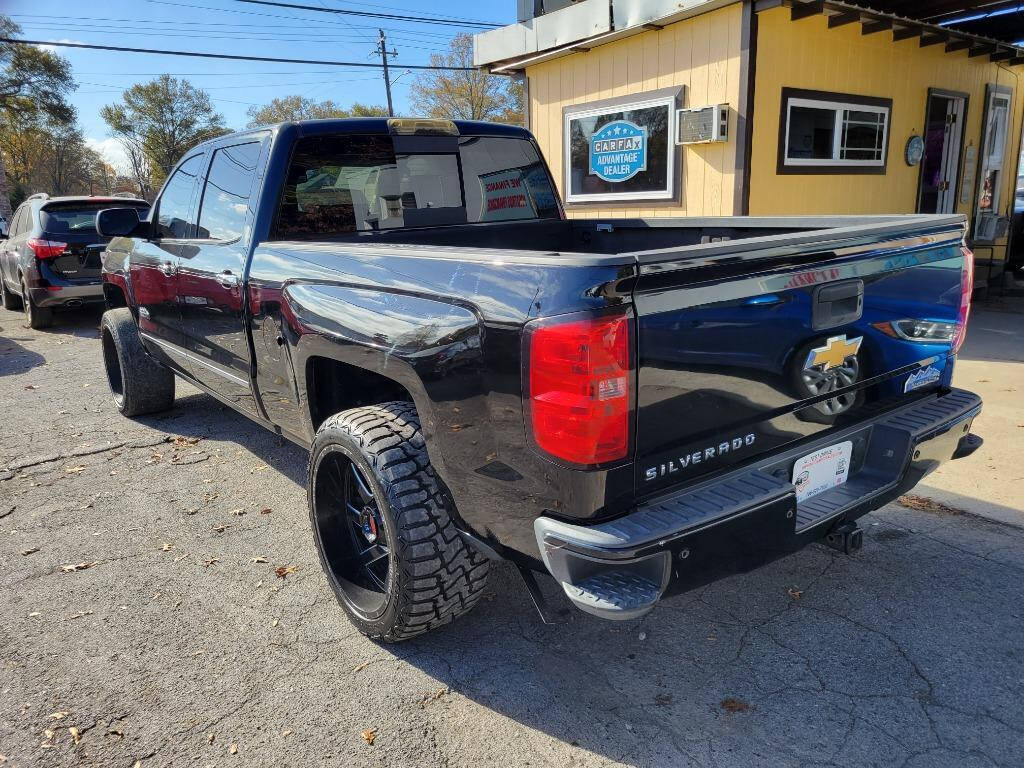 2014 Chevrolet Silverado 1500 for sale at DAGO'S AUTO SALES LLC in Dalton, GA