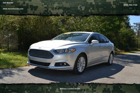 2013 Ford Fusion Hybrid for sale at Car Bazaar in Pensacola FL