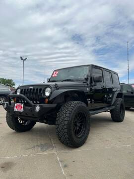 2012 Jeep Wrangler Unlimited for sale at UNITED AUTO INC in South Sioux City NE