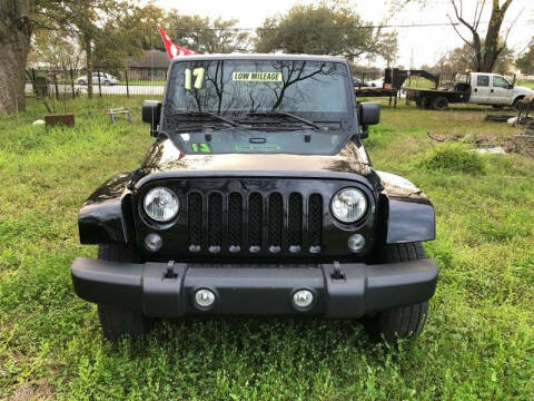 2017 Jeep Wrangler Unlimited for sale at COUNTRY MOTORS in Houston TX