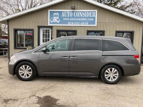 2014 Honda Odyssey for sale at Auto Consider Inc. in Grand Rapids MI