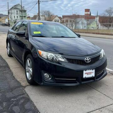 2012 Toyota Camry for sale at A & J AUTO GROUP in New Bedford MA