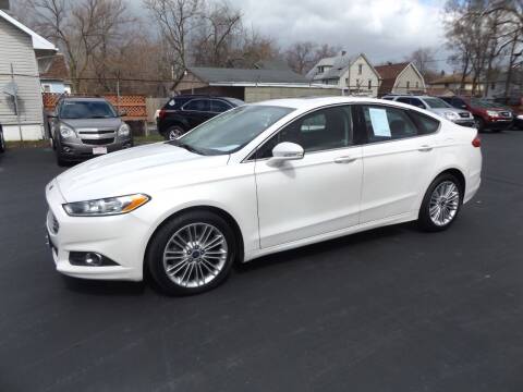 2014 Ford Fusion for sale at Goodman Auto Sales in Lima OH
