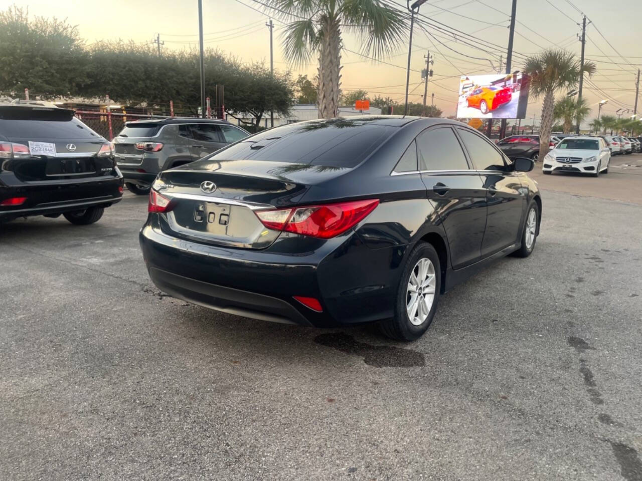 2014 Hyundai SONATA for sale at SMART CHOICE AUTO in Pasadena, TX