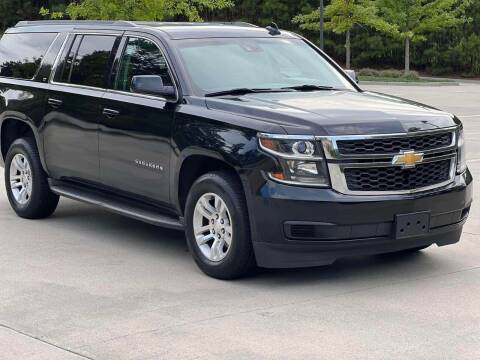 2015 Chevrolet Suburban for sale at Two Brothers Auto Sales in Loganville GA