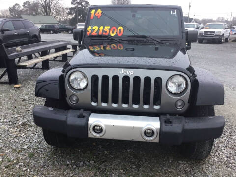 2014 Jeep Wrangler Unlimited for sale at K & E Auto Sales in Ardmore AL