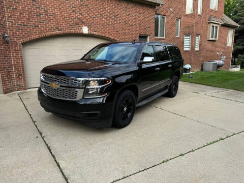 2016 Chevrolet Suburban for sale at Roman's Auto Sales in Warren MI