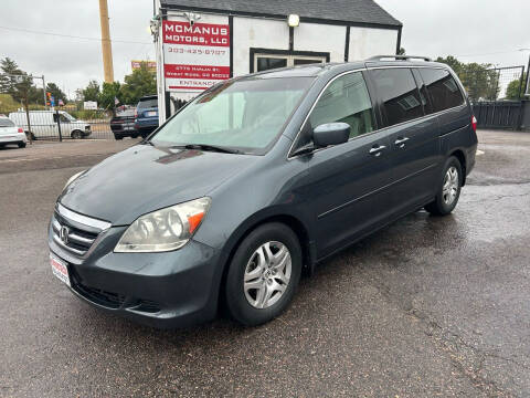 2005 Honda Odyssey for sale at McManus Motors in Wheat Ridge CO