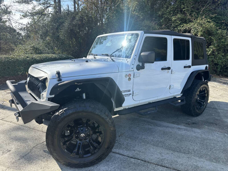 2015 Jeep Wrangler Unlimited for sale at SELECTIVE Cars & Trucks in Woodstock GA