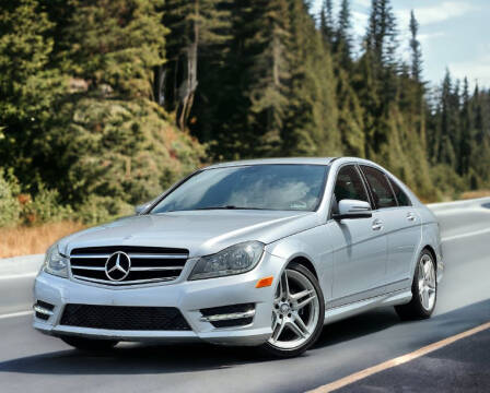 2014 Mercedes-Benz C-Class for sale at Atlanta Unique Auto Sales in Norcross GA