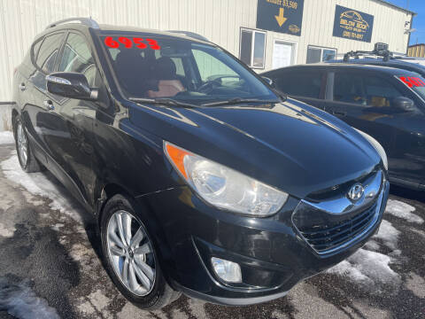 2011 Hyundai Tucson for sale at BELOW BOOK AUTO SALES in Idaho Falls ID