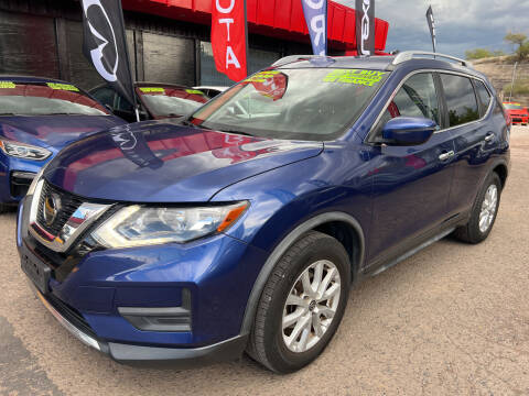 2019 Nissan Rogue for sale at Duke City Auto LLC in Gallup NM