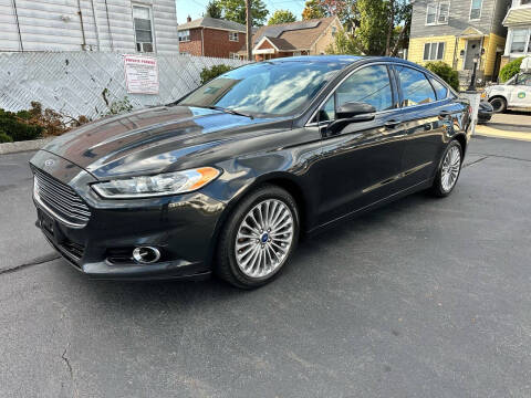 2015 Ford Fusion for sale at Unique Auto Sales Inc. in Clifton NJ