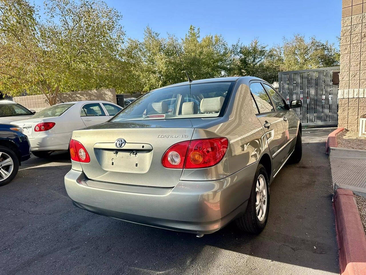 2003 Toyota Corolla for sale at HUDSONS AUTOS in Gilbert, AZ