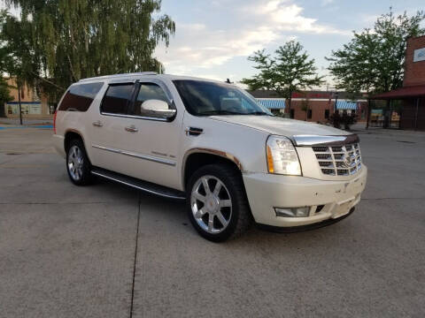 2011 Cadillac Escalade ESV for sale at KHAN'S AUTO LLC in Worland WY