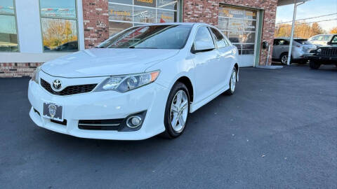 2012 Toyota Camry for sale at Ohio Car Mart in Elyria OH